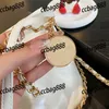 CC Bags Luxury Brand Axel Trend Gold Coin Women Classic Buckle Garbage Bag med Clutch Pearl Leather Mini Handbag Crossbody Metal P