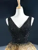 Sexy zwart en gouden v-hals optocht jurken hi-Lo zware kralen tule prom jurk