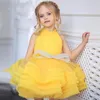 Vestidos de niña amarillo marfil hinchado bebé arco cuello alto primera comunión niños vestido hasta la rodilla flor boda