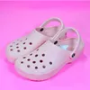 Croc sandalen beroemde ontwerper Dames Mannen Kinderen Clog slides slippers klompen strand waterdichte schoenen gesp