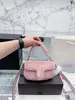 Bolsos de diseñador Totes Hombro C's Pillow Tabby Bag Mujeres altas Color puro Baco Hardware retro Bolsos nublados Cena Cuero real suave