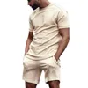 ジムの服の男性トラックスーツセットソリッドカラー薄い夏の短袖Tシャツショーツセットフィットネススポーツジョギングホム