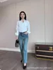 Designer di jeans da donna Nuova tasca posteriore Triangolo Lavaggio decorativo Vita alta Gamba larga Moda versatile T1XZ