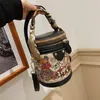 Whole factory ladies shoulder bags sweet cute bear graffiti bucket bag street trend cylinder women ribbon handbag European pop3103