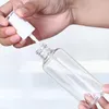 Bottiglie di stoccaggio 30 ml / 50 ml Flacone spray vuoto da 100 ml Mini contenitore cosmetico riutilizzabile per l'erogazione di alcol riutilizzabile in plastica