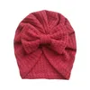 Cappelli 2022 Solido Waffle Crochet Lavorato A Maglia Arco Cappello Del Bambino Turbante Infantile Del Bambino Nato Cap Berretti Headwraps Per Le Ragazze Del Ragazzo 3-5T