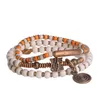 Strand Multi Layer Tibetan Yak Bone Bead Armband Hammered Copper Charm Murano Glass Zen Prayer Peace Energy Jewelry