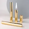 Garrafas de armazenamento 5mlgold nutrição de óleo vazio Tratamento de caneta Revitalizador de cutículas polimento Nutre o tubo cosmético da pele com escova