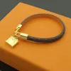 Designer smycken guldbrun läderarmband för kvinnor män charm armband bred hand rem blommamönster logotyp stämpel tryckt fashi246y