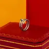 Love Torny Ring cl￡sico dise￱ador de lujo joyer￭a para hombres y anillos para mujeres Titanium Steel Letter Band de doble banda Tama￱o 5-11