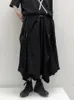 Pantalones de mujer Damas Skirt de pierna ancha Personalidad oscura Fashion Simple Dise￱o irregular Plisado
