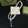 Collares de suéter de cadena de lujo Collar de letras de perlas dobles Letras entrelazadas Collar colgante de diseñador con caja