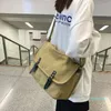 Bolsas de noite Bolsa feminina Trend Student Street Sports Moda de grande capacidade Mensageiro de tela simples para homens e mulheres