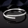 2023 Ny lyxig full diamant manschettarmband för kvinnor mode märke älskar nagel armband klassiska par designer armband rostfritt 2786