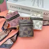 2023 PU deri moda varil çantası Paris moda eski çiçek baskı fermuar cüzdan anahtar zincir silindir ruj ağız sarılı kırmızı paket mini değişim cüzdan t120ee7p
