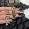 Proste 18K pozłacane luksusowa marka projektanci litery Stud ze stali nierdzewnej geometryczne znane kobiety wkładka kryształ Rhinestone kolczyk wesele biżuteria A852