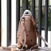 Top new fashion Korean version M punk rivet backpack men and women student bag travel backpack 5716280H