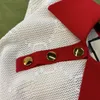 Женский дизайнер свитеров 2022 летняя мода Colorst Contrast Hollow Out Letter Polo воротник золотой пряжка женская пуловер Slim Thin Thin Chort -Relave O6S2