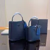 Sacs à provisions chauds Nouveaux fourre-tout Paniers Sacs seau Triangle Fourre-tout Multicolore Le sac fourre-tout Sac de créateur pour femme Sac de luxe en cuir Sac à main Sacs de mode Lady Designers