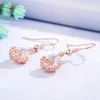 Kolczyki Dangle Rose Gold Ton Elegancki rzeźb z cyrkonem Diamenty szlachetne Kupki dla kobiet mody brincos biżuteria bijoux impreza