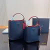 Warme boodschappentassen nieuwe bakken paniers bucket Bags driehoek bakken multicolor de draagtas dames designer tas lederen luxe handtas handtas modezakken dame ontwerpers