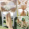 椅子はヴィンテージの黄麻布のサッシーズ素朴なヘシアンカバーボウノットタイのパーティーエルイベントの結婚式の装飾