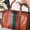 Borsa Boston da viaggio di design Uomo Donna Moda Top Luxury Borsa a mano in pelle cilindrica originale Borse a tracolla diagonali