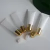 Toptan PE Kozmetik 10ml 15ml Dudak Parlatıcı Tüp Sıkıştırma Mini Şişeler Plastik Tüpler Altın Kapak İletişim Yağı Balsamı Dökme