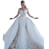 Lyxiga spetsar sjöjungfru bröllopsklänningar med avtagbart tåg överskjorta illusion långa ärmar arabiska dubai brudklänningar 2023 applicerad öppen rygg vestidos