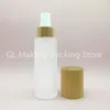 Förvaringsflaskor frostat glas kosmetisk flaska eterisk olja med trä bambu lock pump toppar spray caps 60 ml 30 ml 50 ml 80 ml