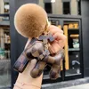 Keychains Lanyards Designer keychain puppy real fur ball pendant key chain car pendant metal fashion personalized creative cute 6 kinds of styles is very good