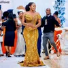 Abiti da ballo a sirena per ragazze africane dorate Sexy al largo della spalla Corsetto Appliques di pizzo In rilievo Plus Size Abiti da sera convenzionali Abito da secondo ricevimento CL1610