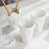 Set di accessori da bagno Articoli da toeletta per il bagno Origami semplice Porta spazzolino in ceramica Dispenser di sapone Bottiglia di emulsione Accessori per tazza di collutorio