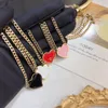 20 Estilo Collar colgante de lujo Hombres Mujeres Triángulo Invertido P Carta Cadena de Oro Joyería Personalidad Cadenas de clavículas
