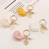 Femmes cuir coeur amour porte-clés métal couleur or perle porte-clés sac pendentif accessoires pour femmes porte-clés bijoux