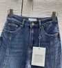 Jeans firmati 2023 Pantaloni a zampa d'elefante dello stilista della nuova primavera estate stesso stile RJ16 da donna di lusso