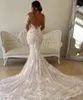 Sexy zeemeermin trouwjurken kristallen kralen kanten appliques juwelen nek illusie lange mouwen bruidsjurken kapel trein gewaad de mariee plus size open back 403