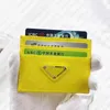 Wallets Designer 2023 Women's Mens Re-Edition Triangle Card Holder Purses Wallets Luxurys Vintage Wallet Leather Retro Wholesale Holders qwertyui879 122422H