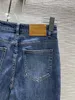 Jeans firmati 2023 Pantaloni a zampa d'elefante dello stilista della nuova primavera estate stesso stile RJ16 da donna di lusso