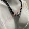 Saturnus zwart kristal enkele laag volledige diamanten ketting punk donkere stijl sleutelbeenketting kan door mannen en vrouwen worden gedragen met box195P