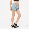 Survêtements pour femmes Hot High-Rise Built-in Cordon de serrage continu Short de yoga respirant à séchage rapide Doublé Sports avec fermeture à glissière cachée Side Drop-in2