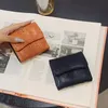 Fashion Purse Niche Design Sense Card Bag Kvinnors nya ihåliga utsökta spänneändringar Anti-Degaussing kreditkortsskydd