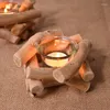 pequeños candelabros de madera