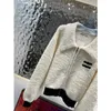 Giacca firmata autunno inverno donna top Ce nuovo stile lanterna manica allentata petto sottile etichetta in pelle grande risvolto latte albicocca cerniera cardigan