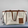 Famosa moda Duffle Cruz cuerpo Bolsa de compras correa para mujer Lona fin de semana madera viaje artículos de tocador Bolso de hombro Luxurys Diseñador cesta grandes bolsos Bolsos de playa