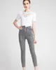 Feestjurken Designer Luxe diamanten wit katoenen t -shirt en potlood jeans set voor vrouwen zomer casual streetwear 2 -delige outfit