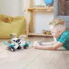 RC -Roboter -Spielzeug wiederaufladbare Roboter, die sich mit Musik und LED -Augen befassen, das sich rotierende Fernbedienungspüle begleitet