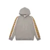 Hoodies للرجال Sweatshirts مصمم الخريف الشتاء الجديد الكلاسيكية العاكسة الجانبية لصق القليل للرجال النساء j6ky