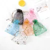 Emballage cadeau 100 pièces étoiles lune Organza sacs à cordon bijoux emballage bonbons mariage anniversaire cadeaux pochettes bonbons