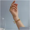 뱅글 k1european and American Ins Jewelry Bracelet 라인 Doublelayer Twisted Wire Knotted Open Ring Titanium Steel Drop Delivery Brac DHKVO